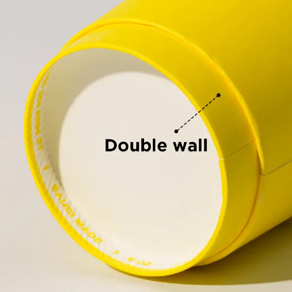 Estructura de doble pared de un vaso de papel amarillo personalizado mostrado con detalle